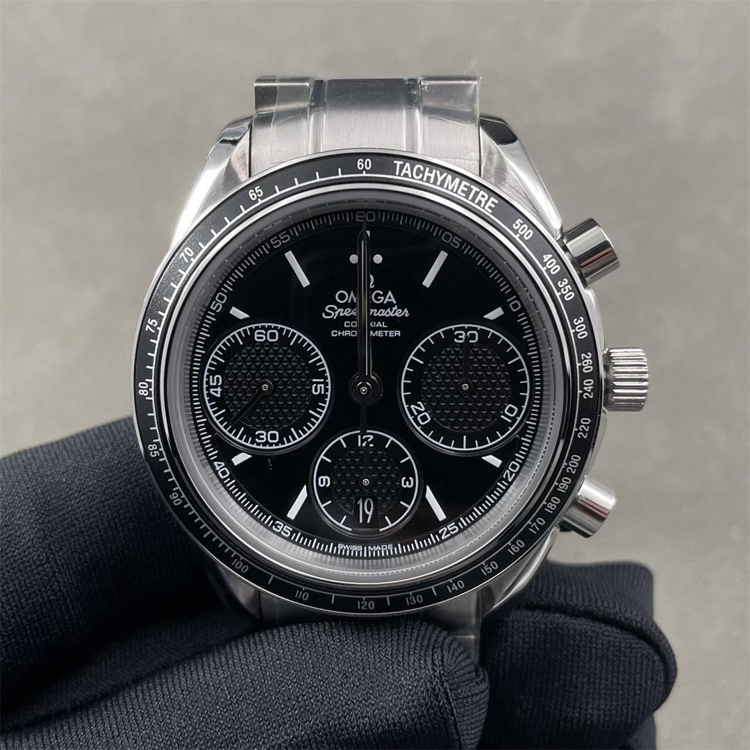 Speedmaster Racing 40mm — Brazalete acero 316L macizo · Esfera negra con subesferas negras · Bisel taquímetro · Cronó A7750